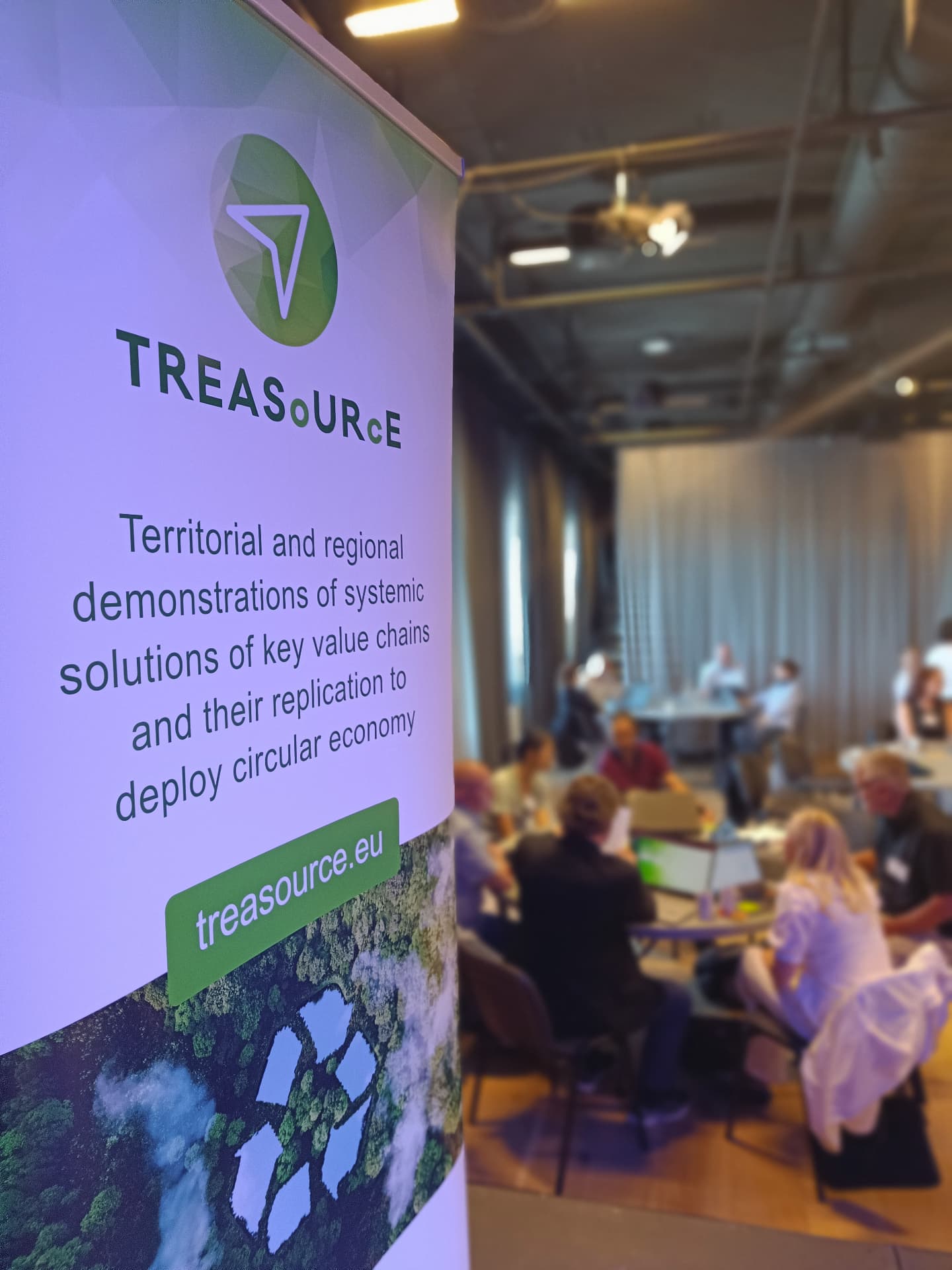 TREASoURcE roll-up banner at a project event